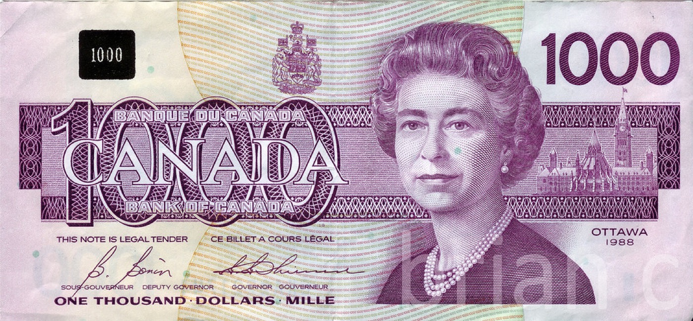 Canadian banknotes and coins set aside as savings
