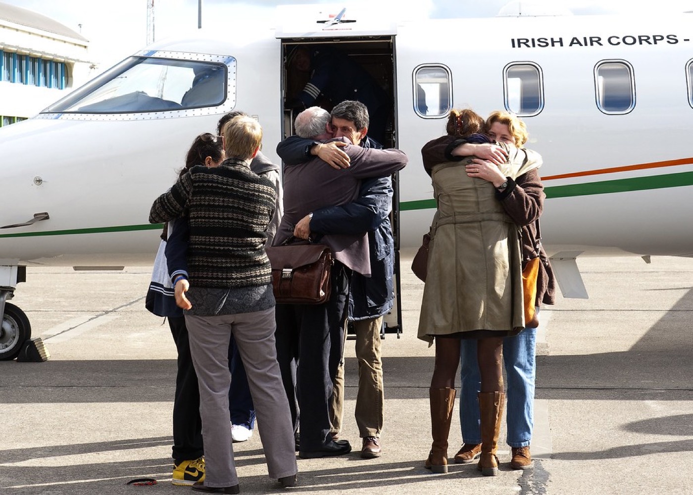 Families greeting each other after an international arrival